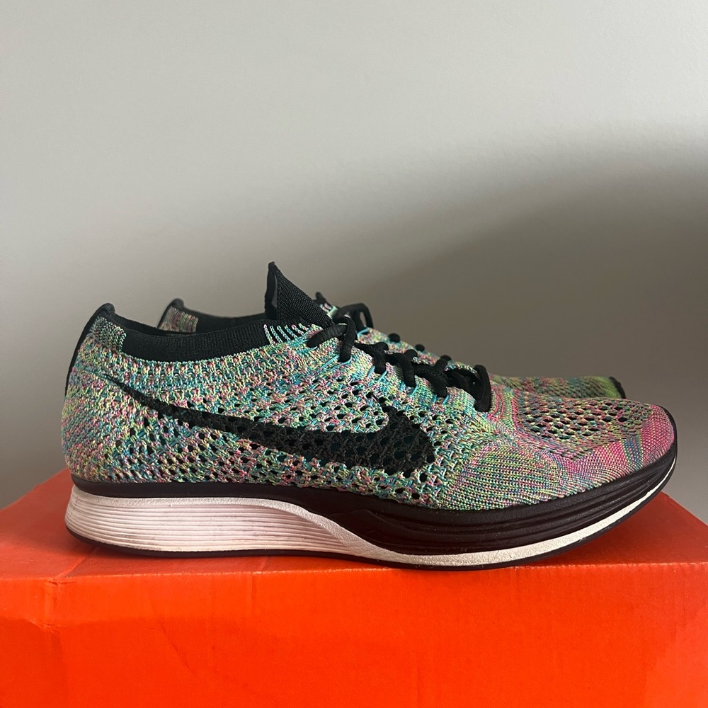 Nike multi colour flyknit racer 
Unisex